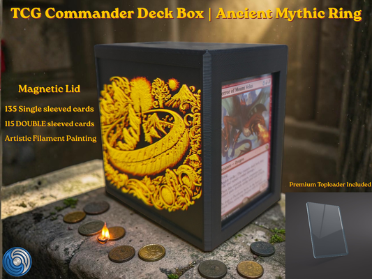 Black 3D printed TCG Commander deck box placed on a stone ritual altar background with glowing coins. The front face features a highly detailed, textured 2.5D filament painting in vibrant gold and yellow, depicting an ancient fantasy spellbook cover with an inscribed burning mythic ring. Text overlay highlights a magnetic lid and a capacity of 115 double-sleeved or 135 single-sleeved cards.
