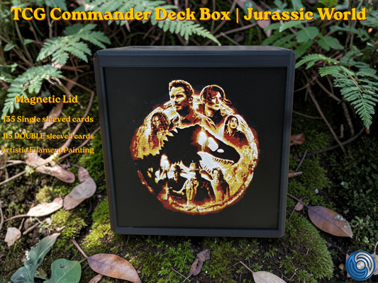 Jurassic World themed TCG Commander deck box, UK made 3D printed EDH vault with HueForge artistic filament painting dinosaur design, magnetic lid, commander card display window with free premium toploader, holds 115 double sleeved or 135 single sleeved cards, compatible with MTG, One Piece TCG, Disney Lorcana, Flesh and Blood, Yu-Gi-Oh, Pokémon, photographed in jungle forest setting