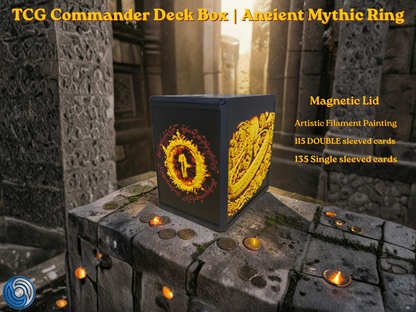Black 3D printed TCG Commander deck box placed on a stone ritual altar background with glowing coins. The front face features a highly detailed, textured 2.5D filament painting in vibrant gold and yellow, depicting an ancient fantasy spellbook cover with an inscribed burning mythic ring. Text overlay highlights a magnetic lid and a capacity of 115 double-sleeved or 135 single-sleeved cards.