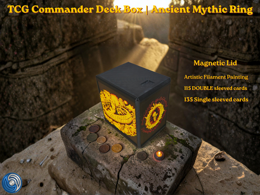 Black 3D printed TCG Commander deck box placed on a stone ritual altar background with glowing coins. The front face features a highly detailed, textured 2.5D filament painting in vibrant gold and yellow, depicting an ancient fantasy spellbook cover with an inscribed burning mythic ring. Text overlay highlights a magnetic lid and a capacity of 115 double-sleeved or 135 single-sleeved cards.