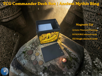 Black 3D printed TCG Commander deck box placed on a stone ritual altar background with glowing coins. The front face features a highly detailed, textured 2.5D filament painting in vibrant gold and yellow, depicting an ancient fantasy spellbook cover with an inscribed burning mythic ring. Text overlay highlights a magnetic lid and a capacity of 115 double-sleeved or 135 single-sleeved cards.
