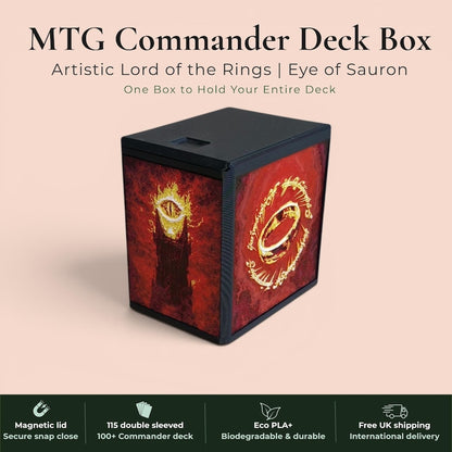Lord of the Rings Eye of Sauron MTG Commander deck box — 3D printed PLA+, handcrafted in the UK. Features the fiery Eye of Sauron and One Ring with Elvish rune inscriptions in crimson and gold. Magnetic closure, holds 115+ double sleeved cards, hero display compartment included. Available in black, burgundy red or forest green. Perfect for MTG EDH, Lorcana, Pokémon TCG fans.