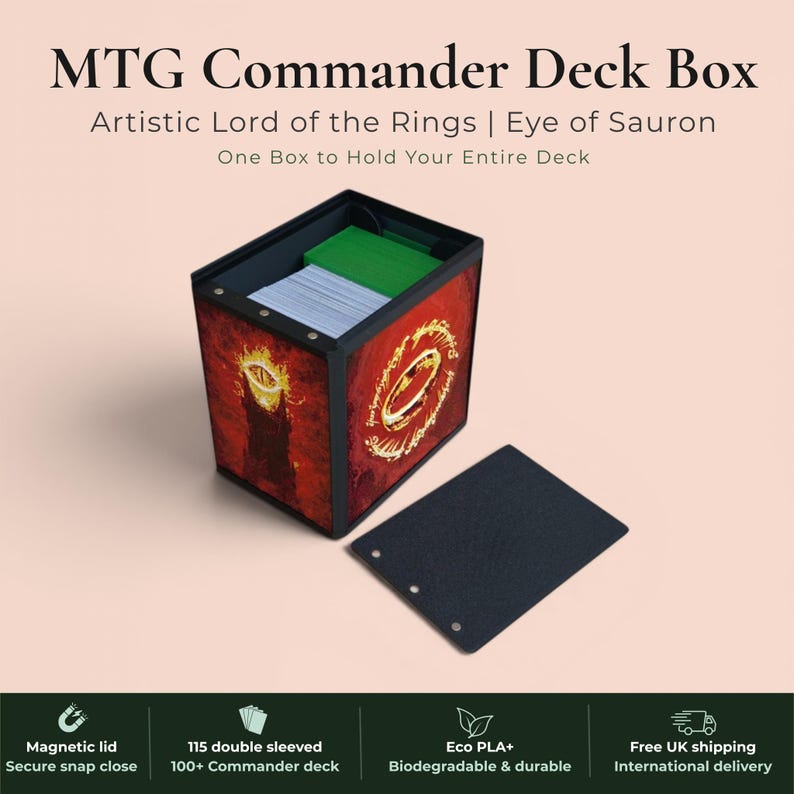Lord of the Rings Eye of Sauron MTG Commander deck box — 3D printed PLA+, handcrafted in the UK. Features the fiery Eye of Sauron and One Ring with Elvish rune inscriptions in crimson and gold. Magnetic closure, holds 115+ double sleeved cards, hero display compartment included. Available in black, burgundy red or forest green. Perfect for MTG EDH, Lorcana, Pokémon TCG fans.